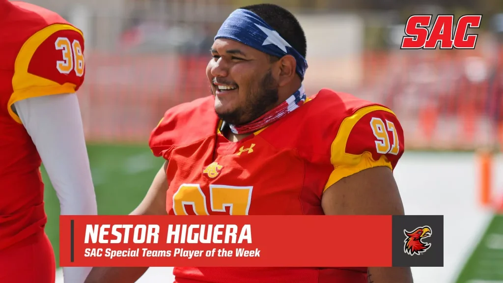 Football player in red and yellow uniform with '97' on jersey, smiling during a game; banner reads 'Nestor Higuera' and 'SAC Special Teams Player of the Week' with SAC logo top right.