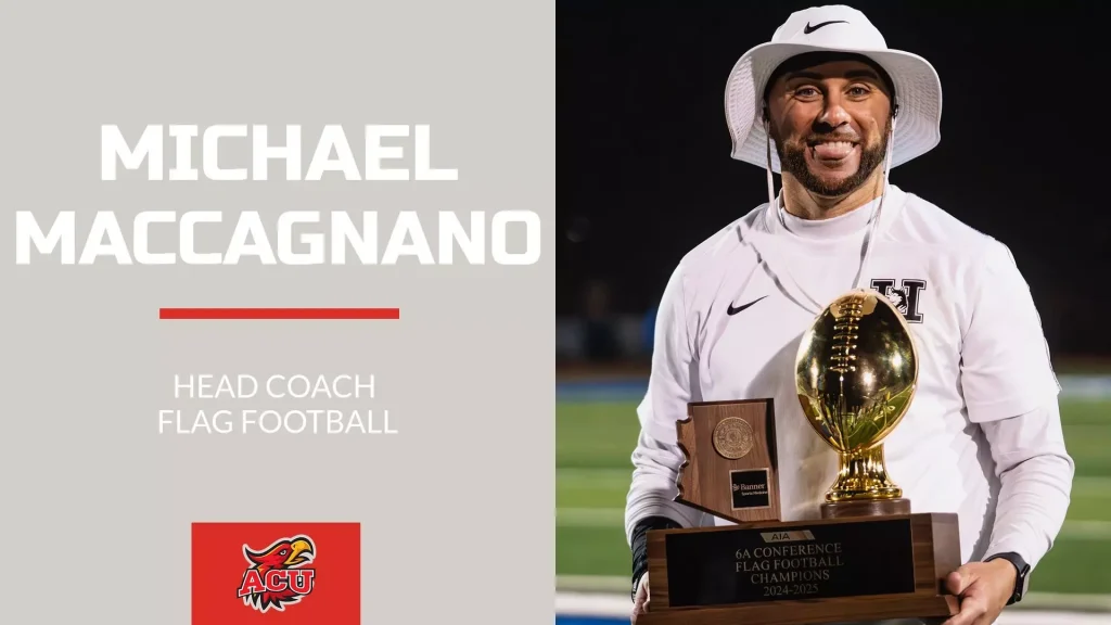 Michael Maccagnano, head coach for flag football, posing with trophy and plaque on a field poster
